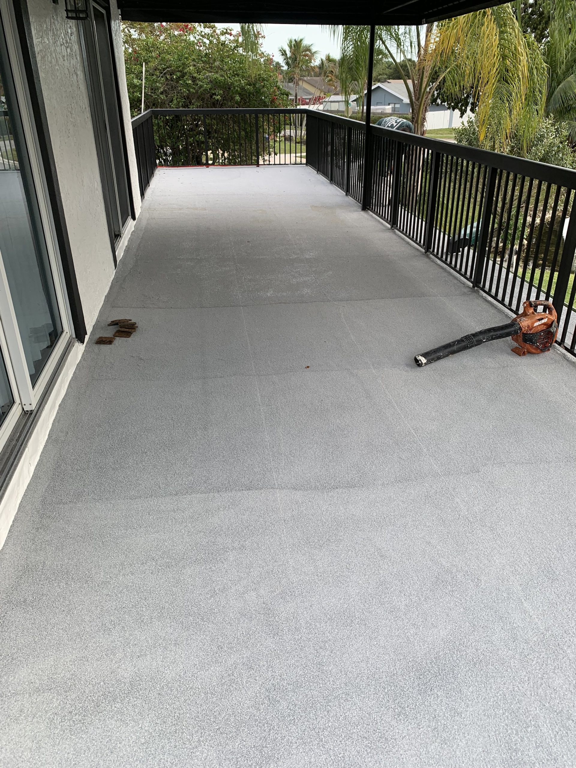 Coated balcony walkway after waterproofing