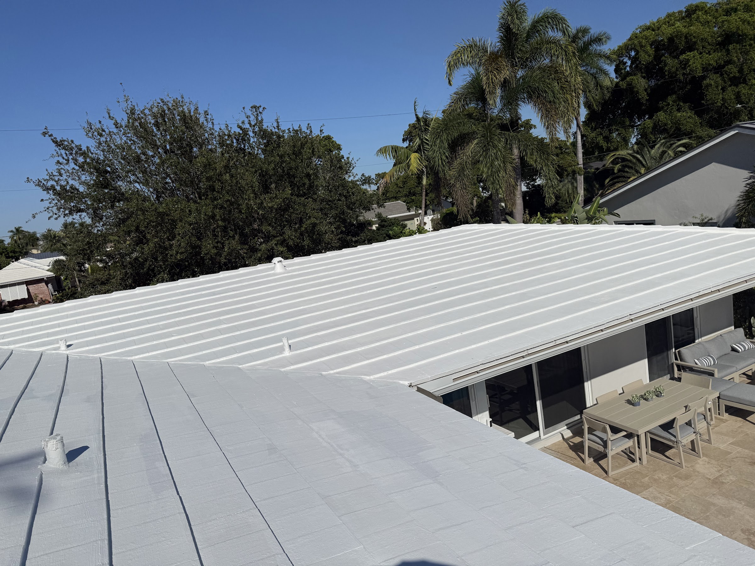 White metal roof panels on a Florida home