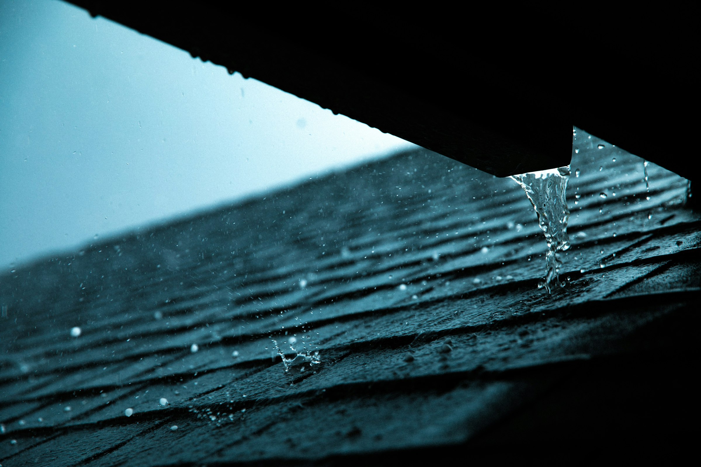 Close-up of a rain gutter along a roof edge
