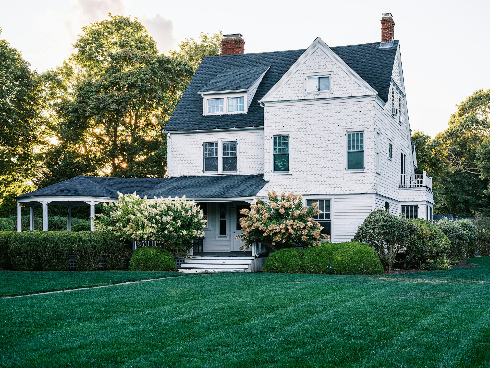Large white home with painted siding
